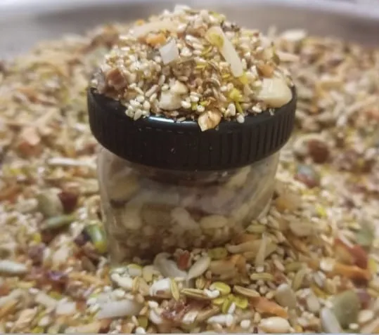 A jar of Nutri Fresh Mukhwaas with seeds, nuts and coconut